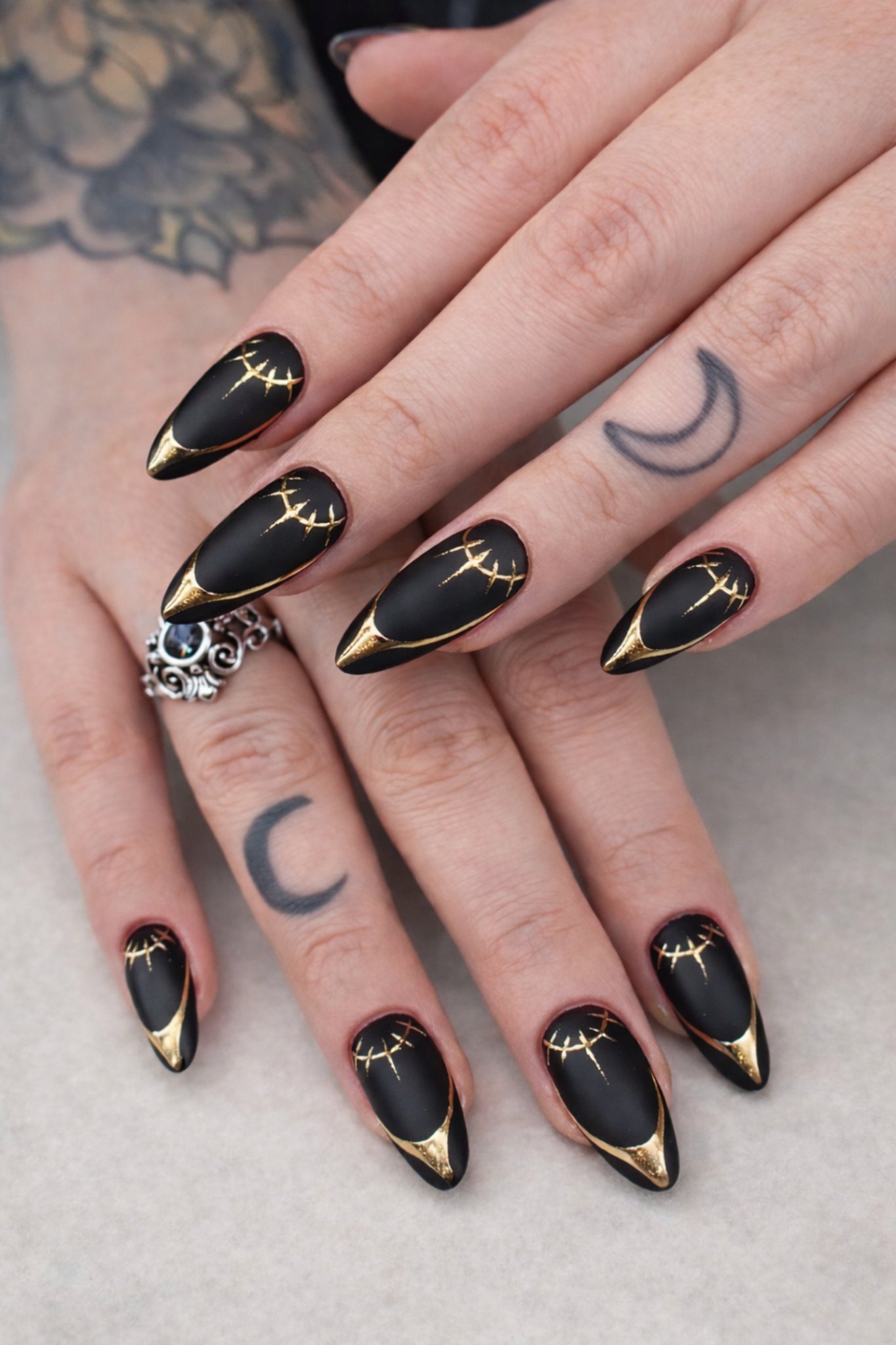 Black gold gothic nails
